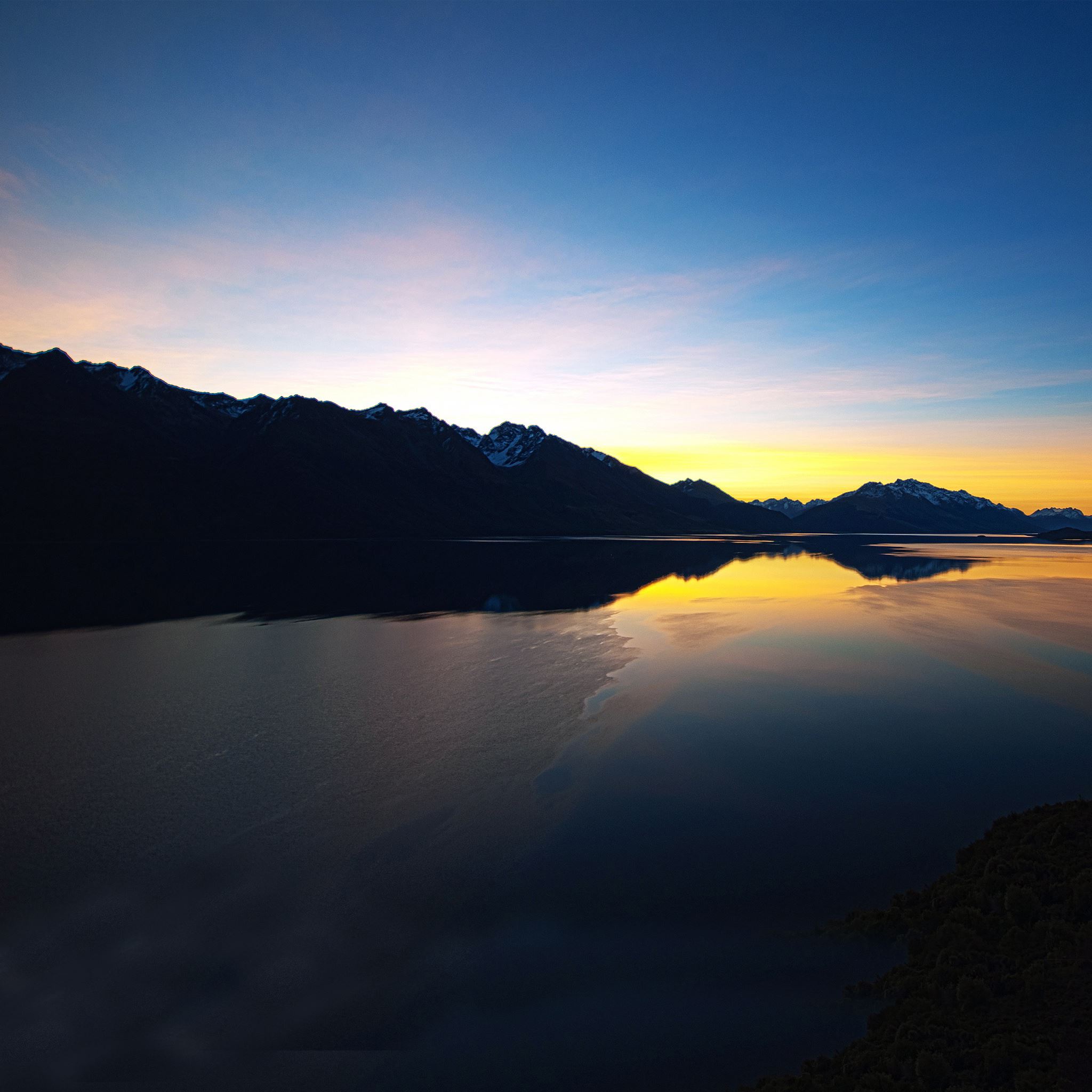 Sunset over mountain lake iPad Air wallpaper 