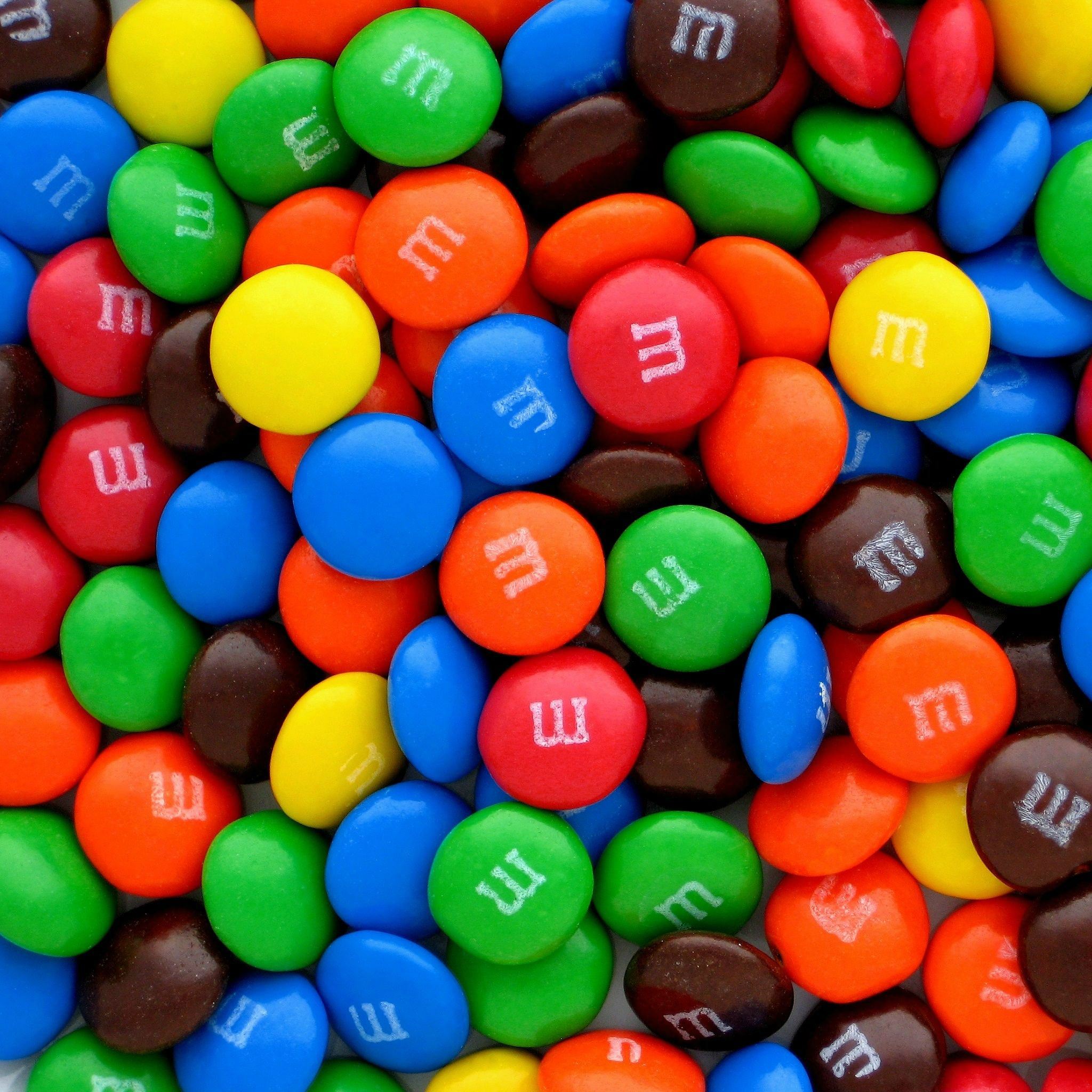 Colorful M&Ms Candy Pills Overlap iPad Air wallpaper 