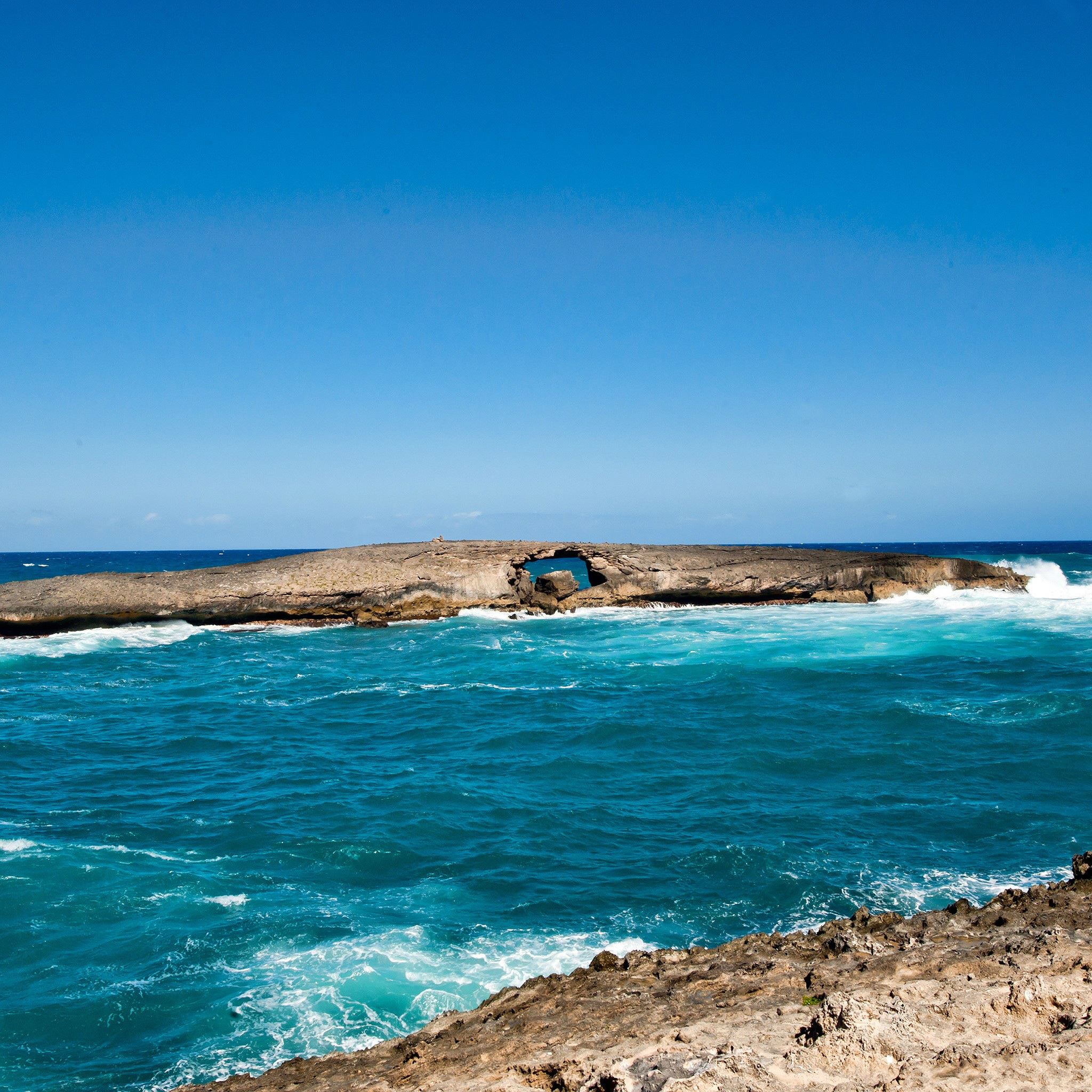 Sunny Blue Ocean Rock Landscape iPad Air wallpaper 