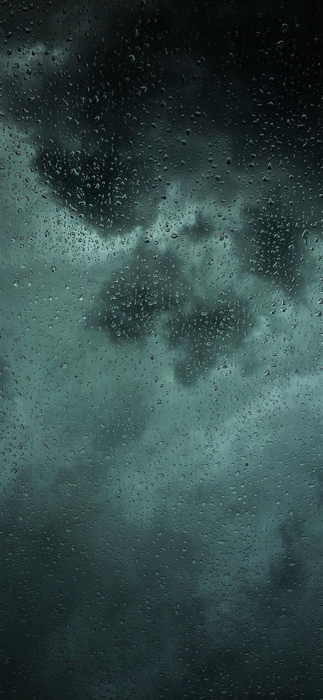 dew drops on glass panel iPhone 12 wallpaper 