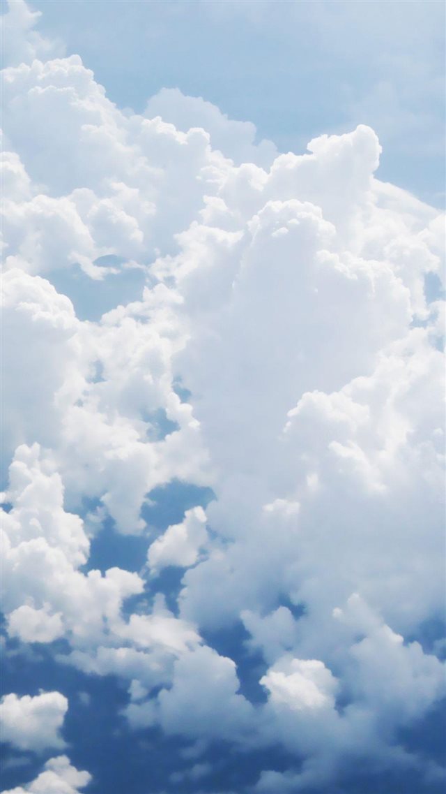 Puffy White Clouds iPhone 8 wallpaper 