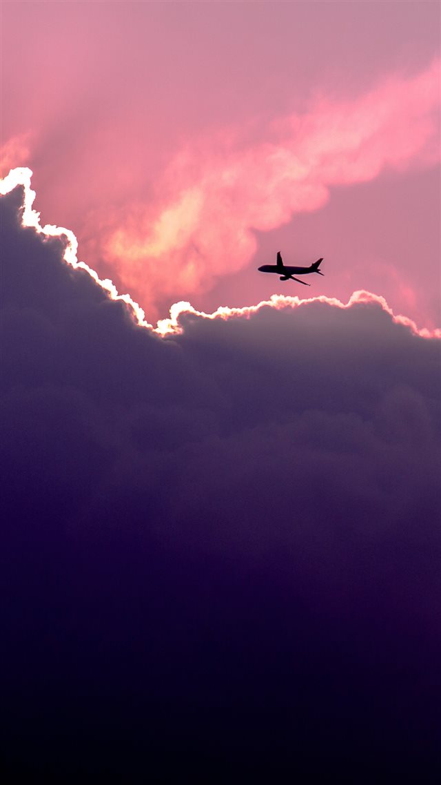Plane Above Sunset Clouds iPhone 8 wallpaper 