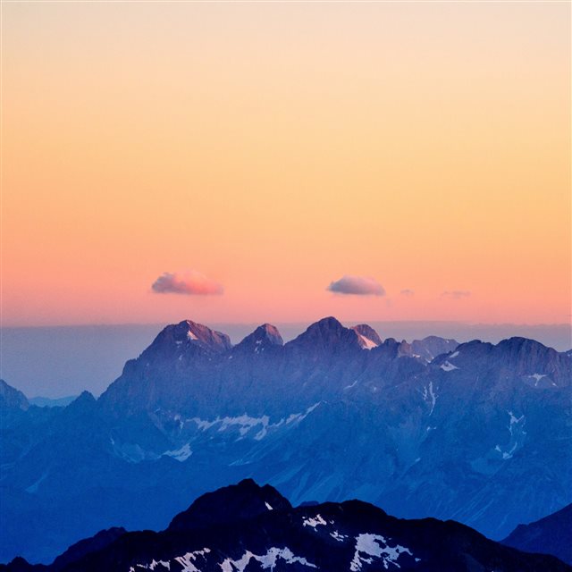 Mountains Fog Sunset Sky iPad Pro wallpaper 