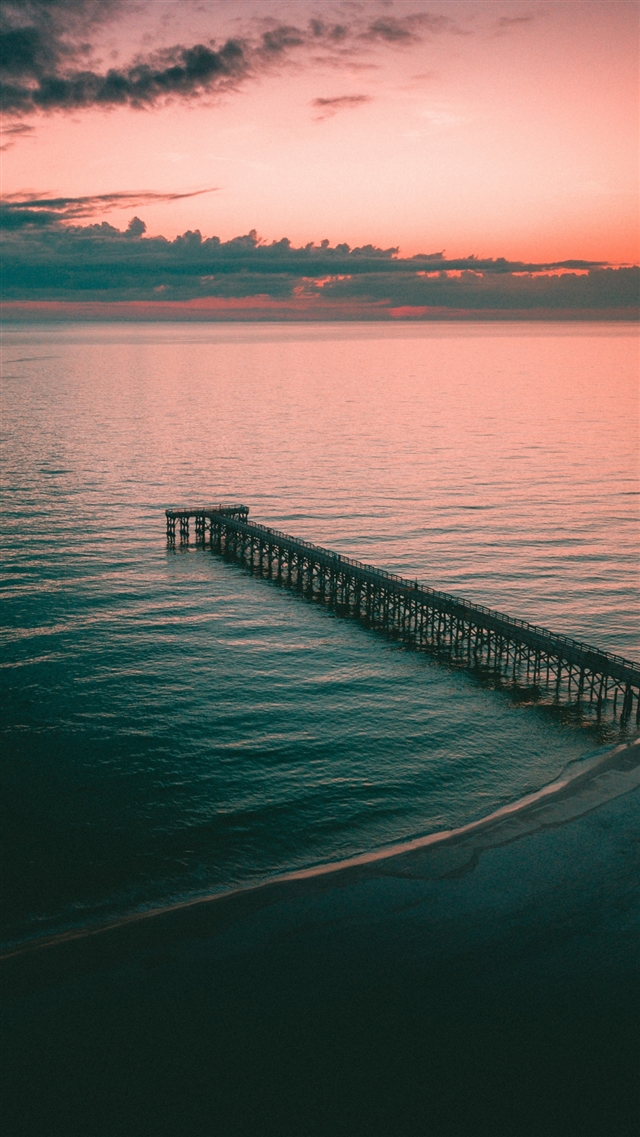 Pier dock sea dusk shore iPhone 8 wallpaper 