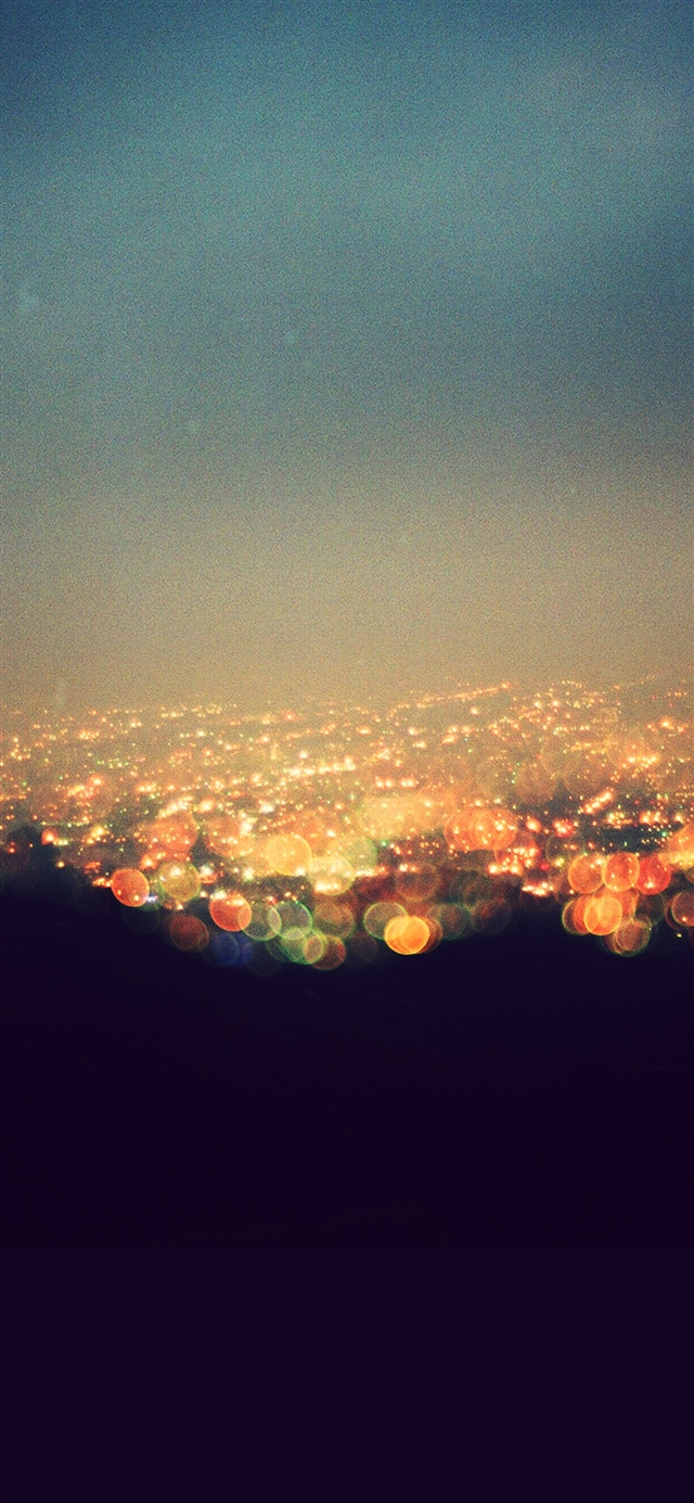 Bokeh night city view lights iPhone X wallpaper 