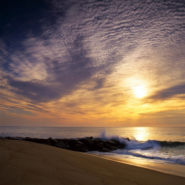 Sun sky clouds sea waves stones breakwater iPad Pro wallpaper 