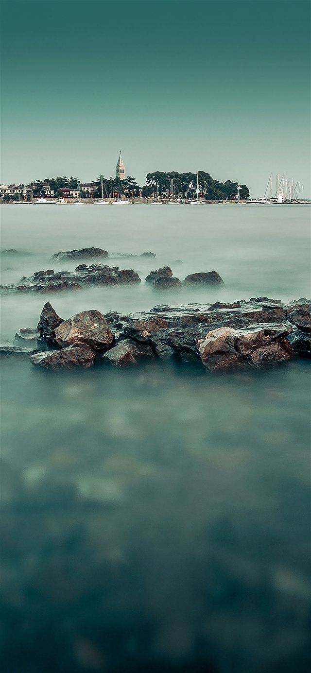 Foggy island sea iPhone X wallpaper 