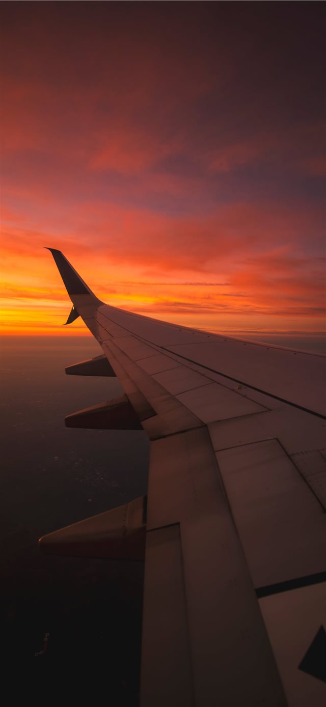 Sunset View From the Window of an Airplane iPhone X wallpaper 