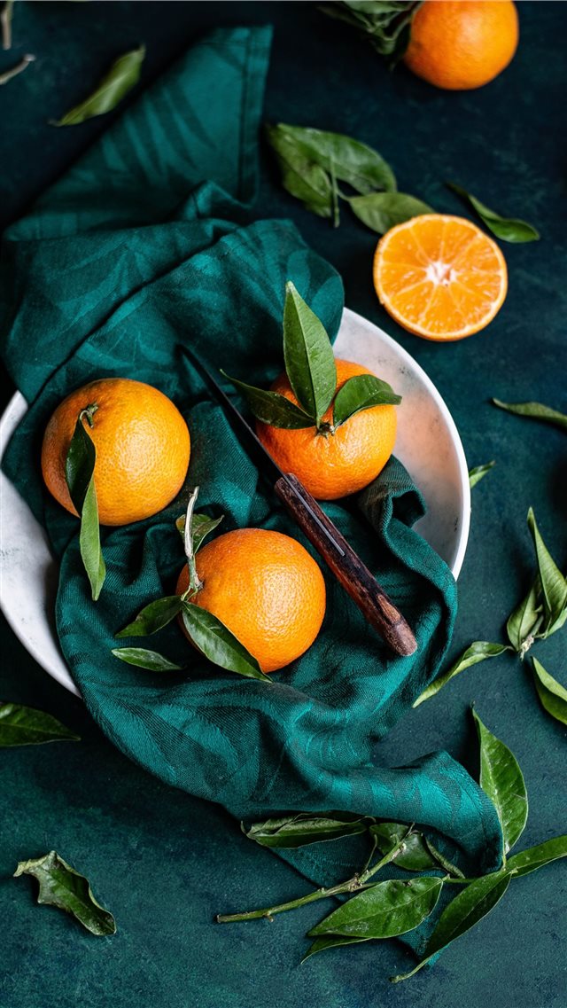 Clementines with leaves iPhone 8 wallpaper 