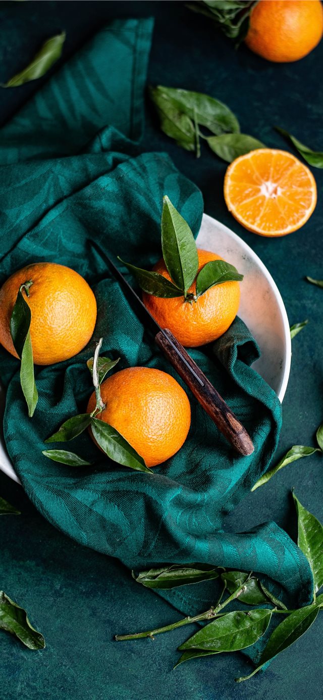 Clementines with leaves iPhone X wallpaper 