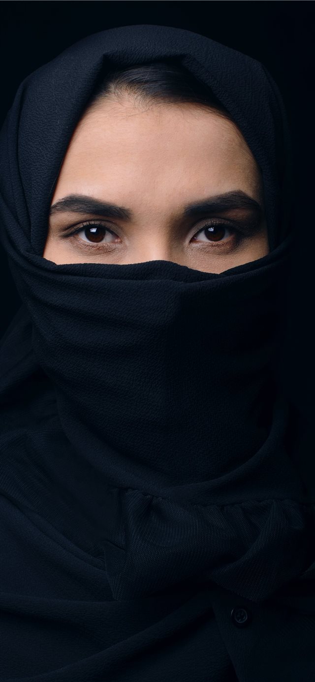 woman in black top and headdress iPhone X wallpaper 