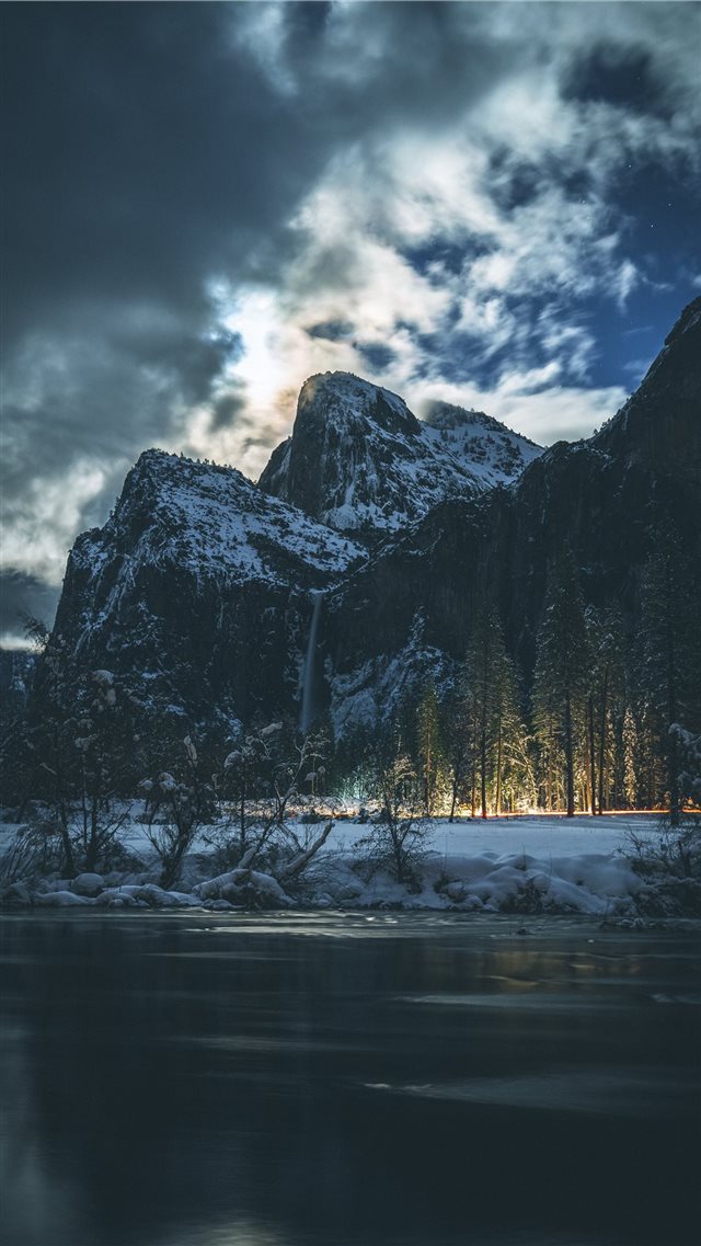 landscape photography of mountain under white sky iPhone 8 wallpaper 