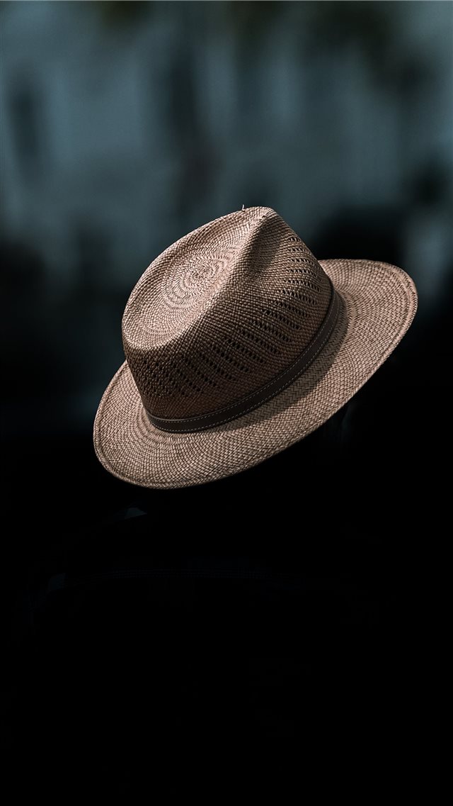 A Floating Hat  spotted in the streets of Saarbrü... iPhone 8 wallpaper 