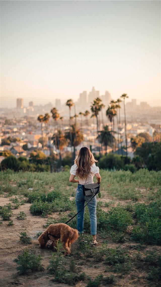 Carleigh  Odie and I out for a walk in East Los An... iPhone 8 wallpaper 