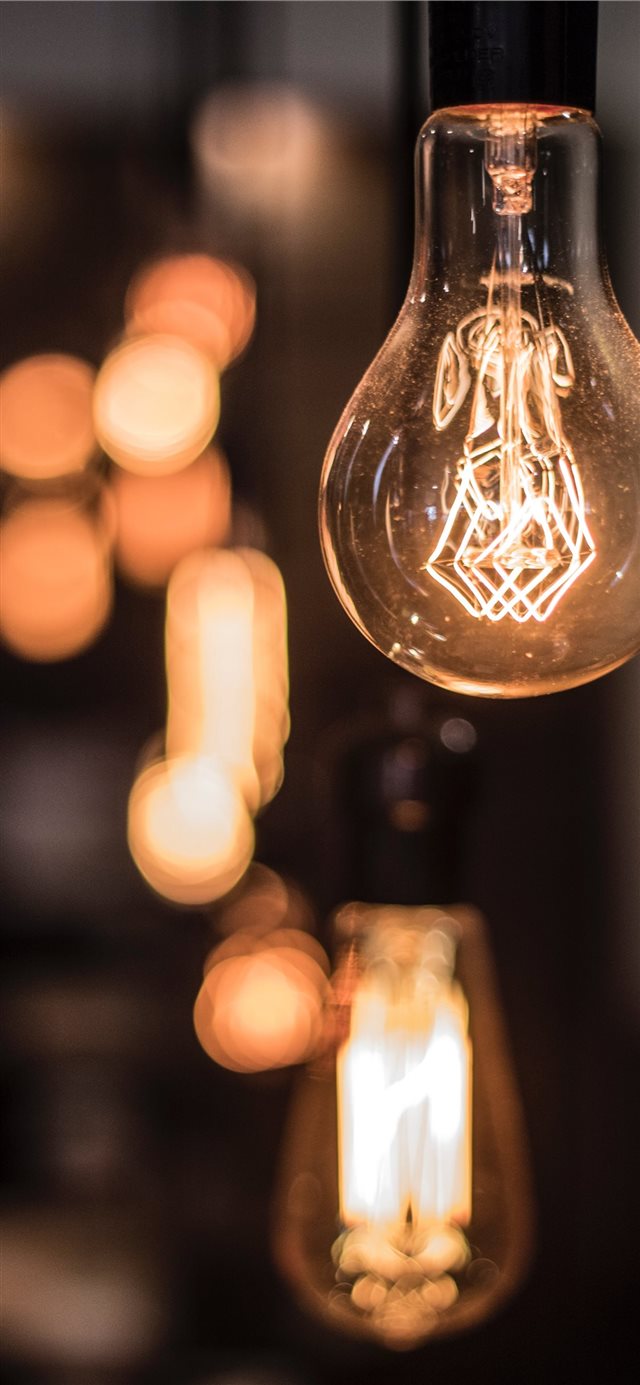 Vintage lightbulb inside a coffee shop in Mexico C... iPhone X wallpaper 