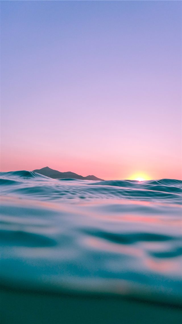 calm body of water during golden hour iPhone 8 wallpaper 
