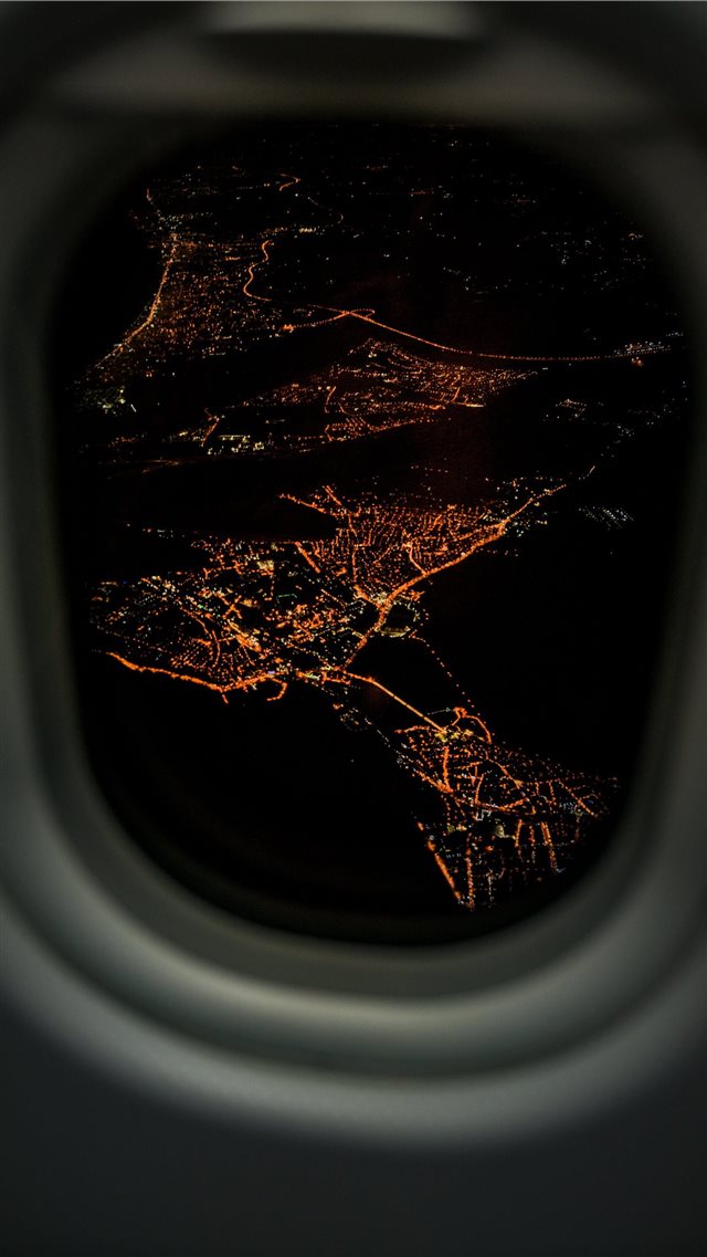 lighted city airplane view iPhone 8 wallpaper 