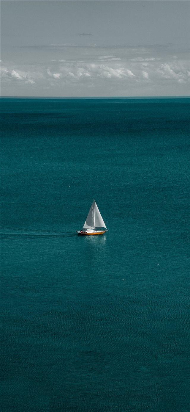 white and brown boat in body of water iPhone X wallpaper 