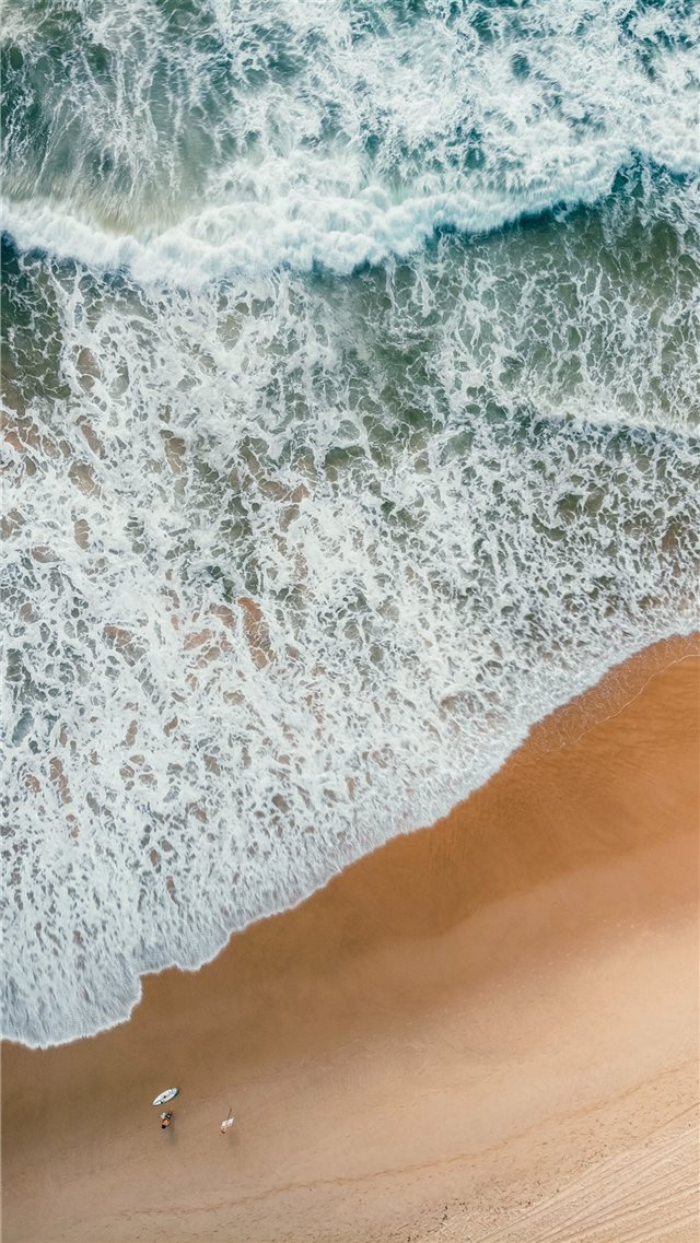 aerial photography of rampaging sea during daytime iPhone 8 wallpaper 