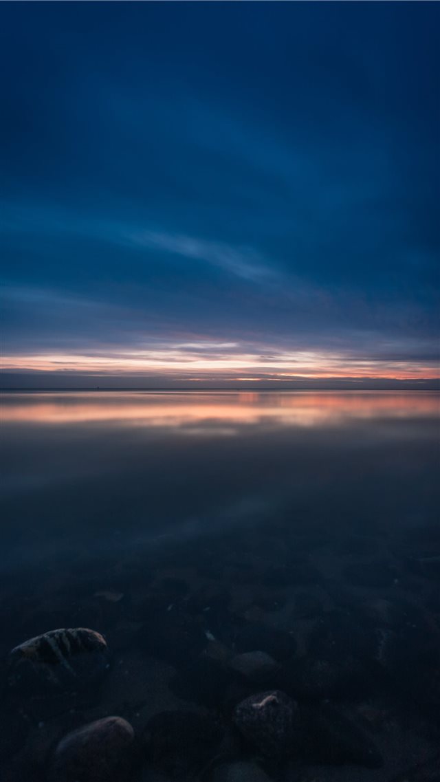 body of water at night iPhone 8 wallpaper 