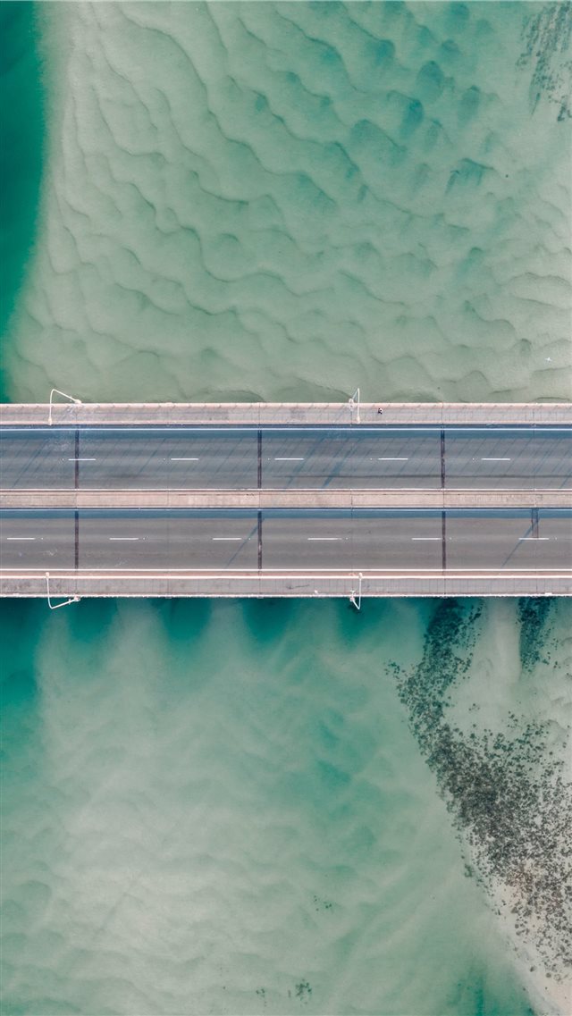 high angle photo of gray concrete road iPhone 8 wallpaper 