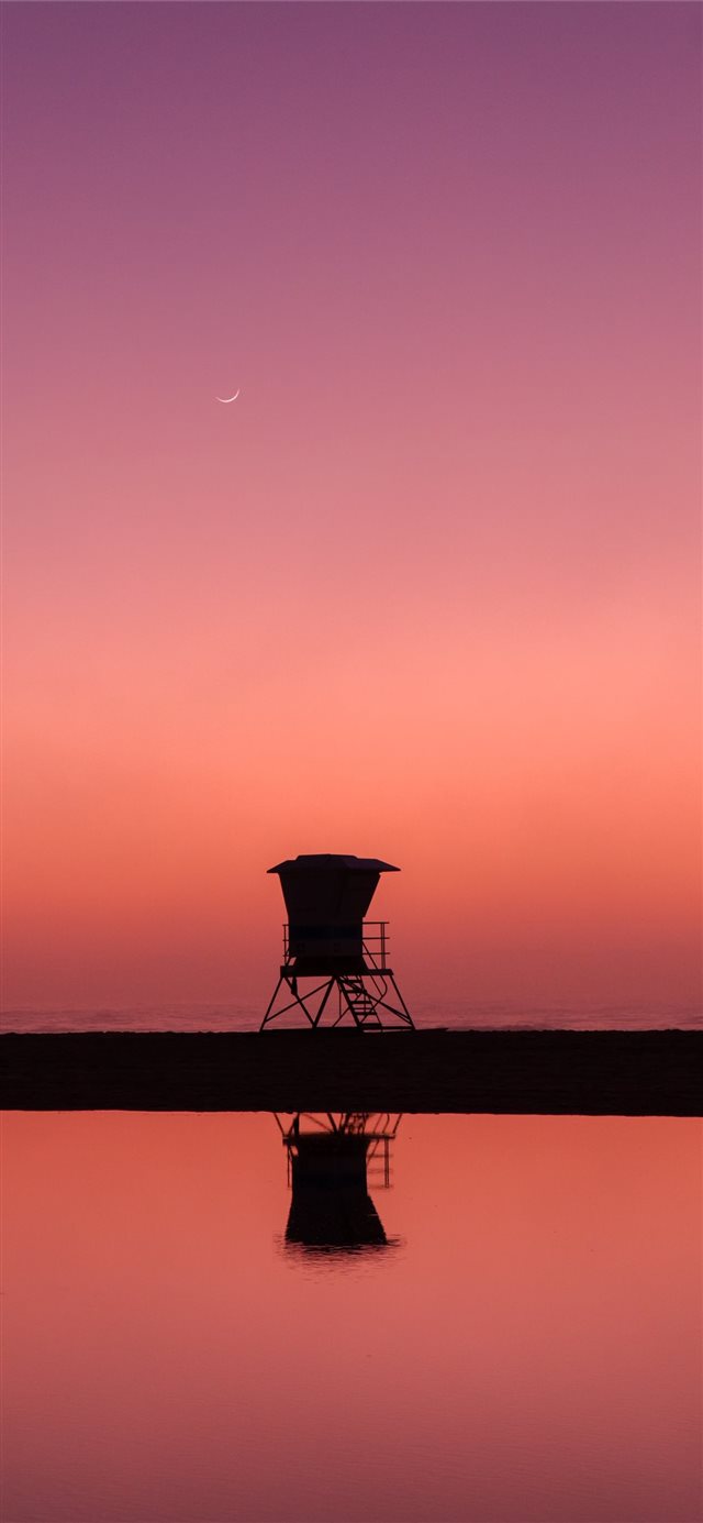 silhouette photo of lifeguard house iPhone X wallpaper 