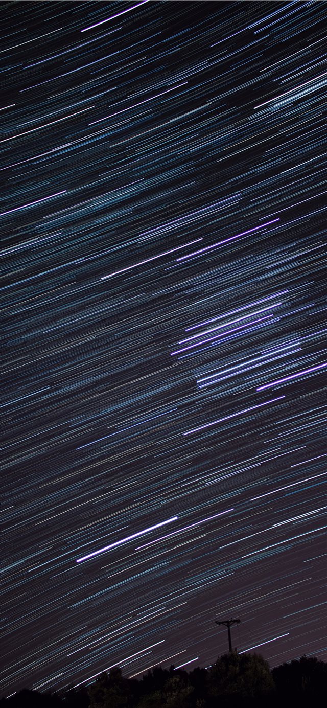 time lapse photography of falling stars iPhone X wallpaper 