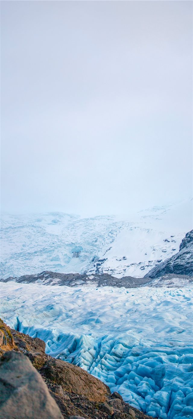 white mountains during daytime iPhone X wallpaper 