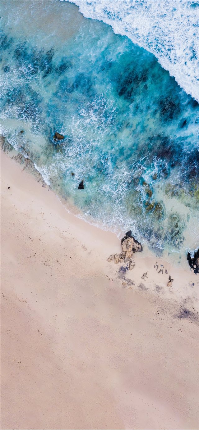 bird's eye photography of body of water near shore iPhone X wallpaper 