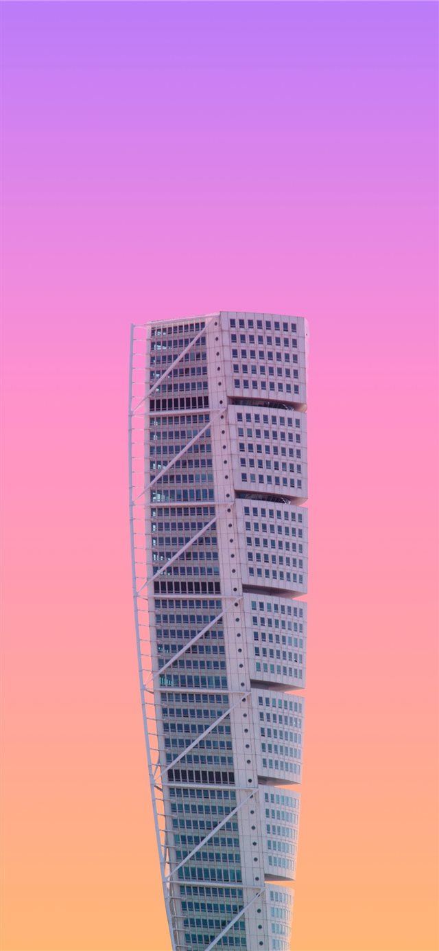 white high rise building under a purple sky iPhone X wallpaper 