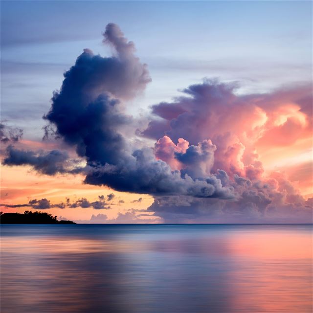 clouds over the sea 8k iPad Pro wallpaper 