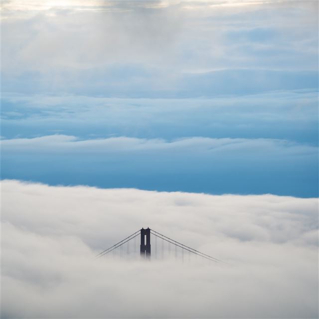 aerial view of bridge under clouds 8k iPad Pro wallpaper 