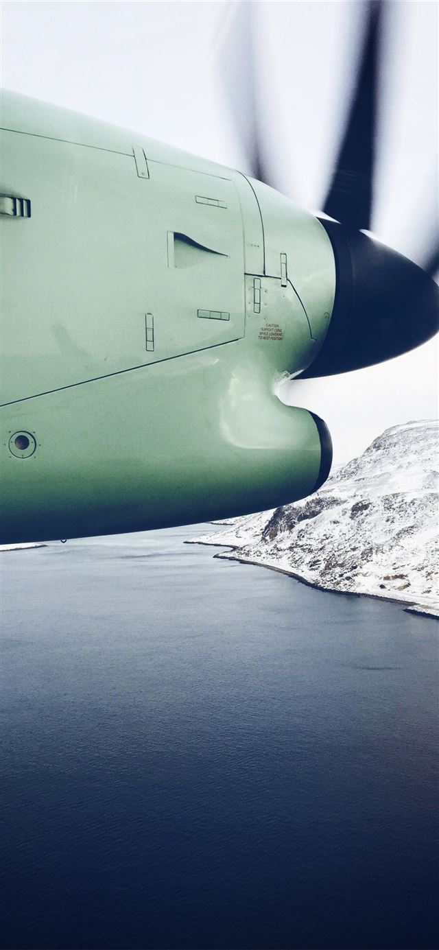 white plane flying over lake iPhone 8 wallpaper 