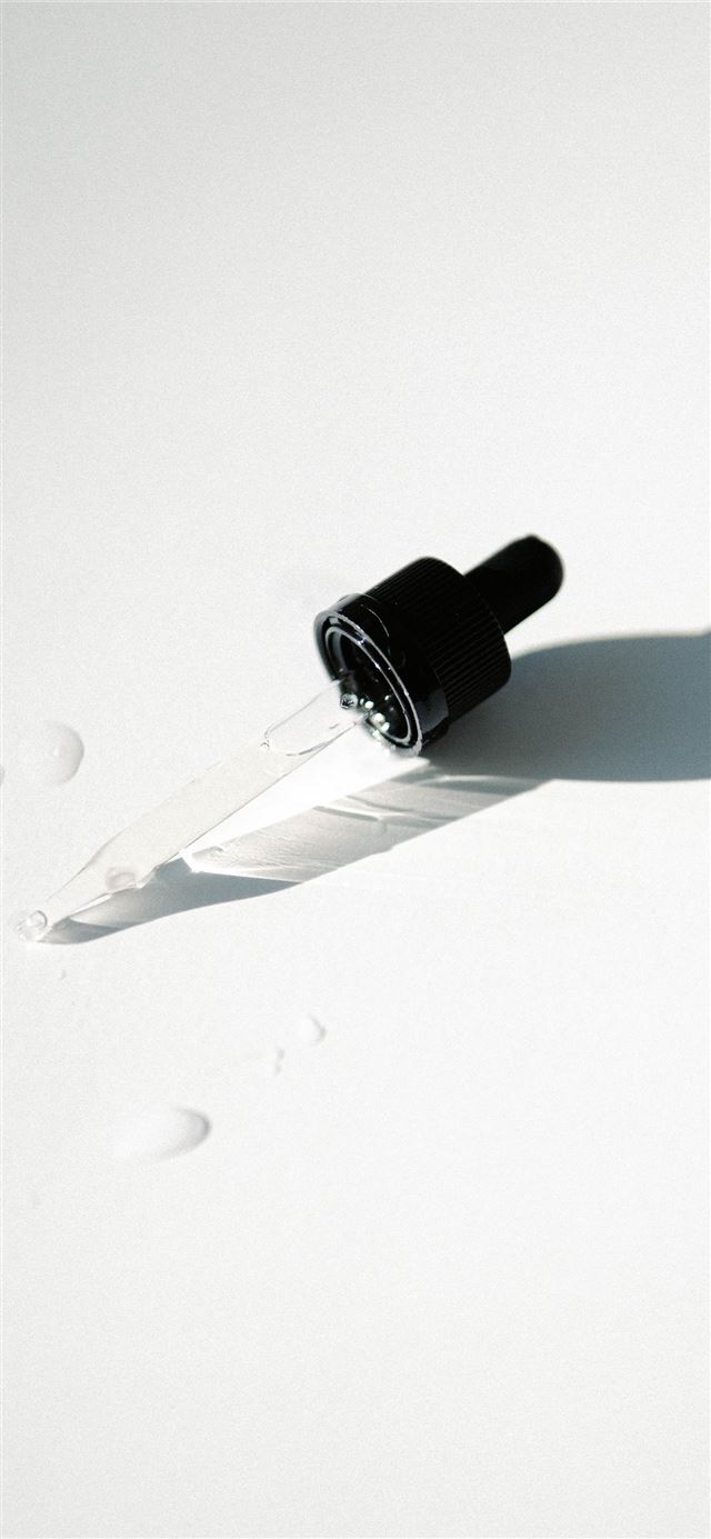 black and silver tube on white surface iPhone 8 wallpaper 