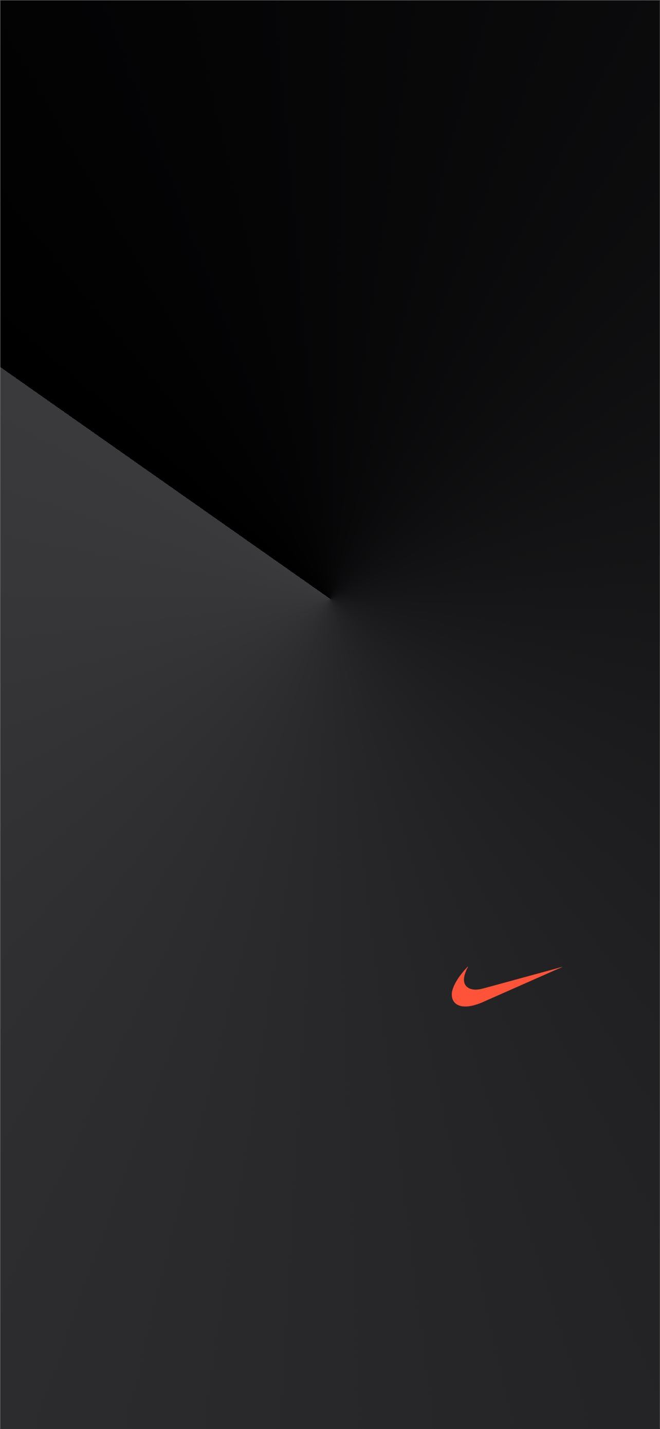 Khi màn hình nền của bạn quá sáng và chói, hãy chọn ngay hình nền Nike tối cho iPhone của bạn để tạo ra một không gian đầy bí ẩn và mạnh mẽ. Với những gam màu đen và xám huyền bí, bạn sẽ cảm thấy thư giãn hơn và tập trung hơn khi sử dụng điện thoại.