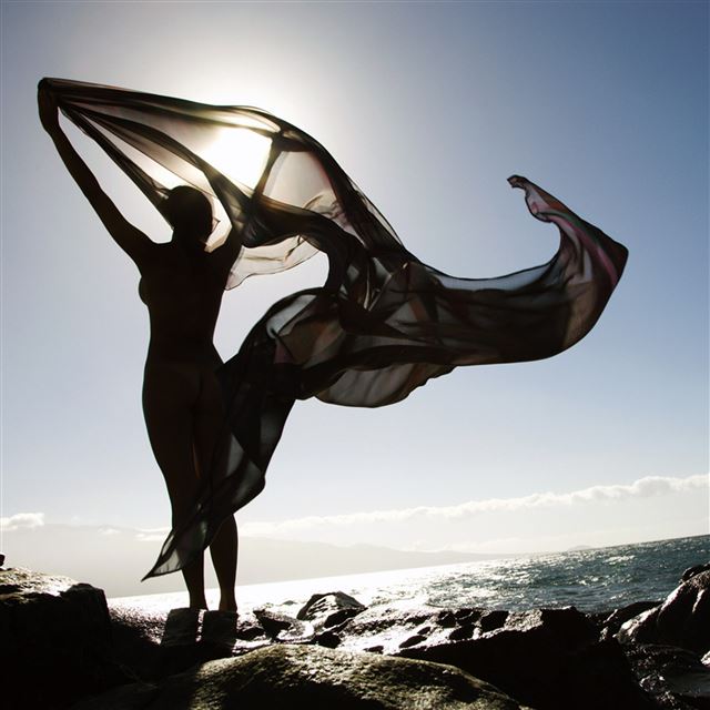 2048x2048 Filipino Young Nude Woman Standing On Rocky Beach Sihouetted Against Sky Holding Flowing Fabric - silhouette iPad Air Wallpaper