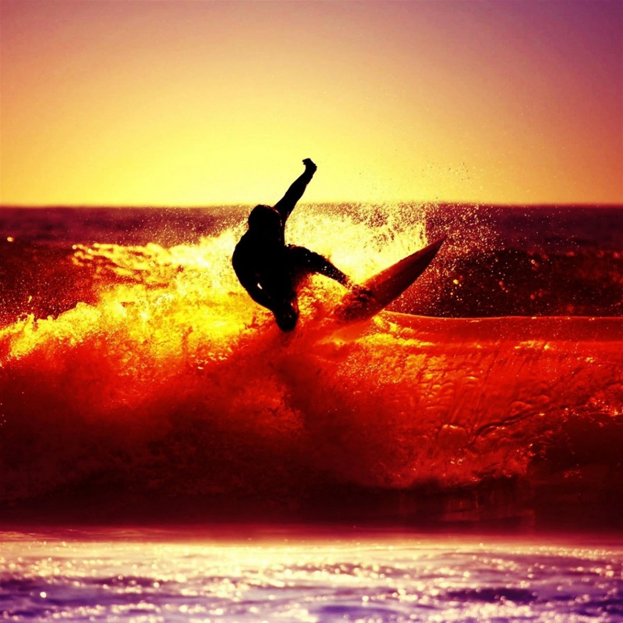 Surfing Under Ocean Sunset iPad Air wallpaper 