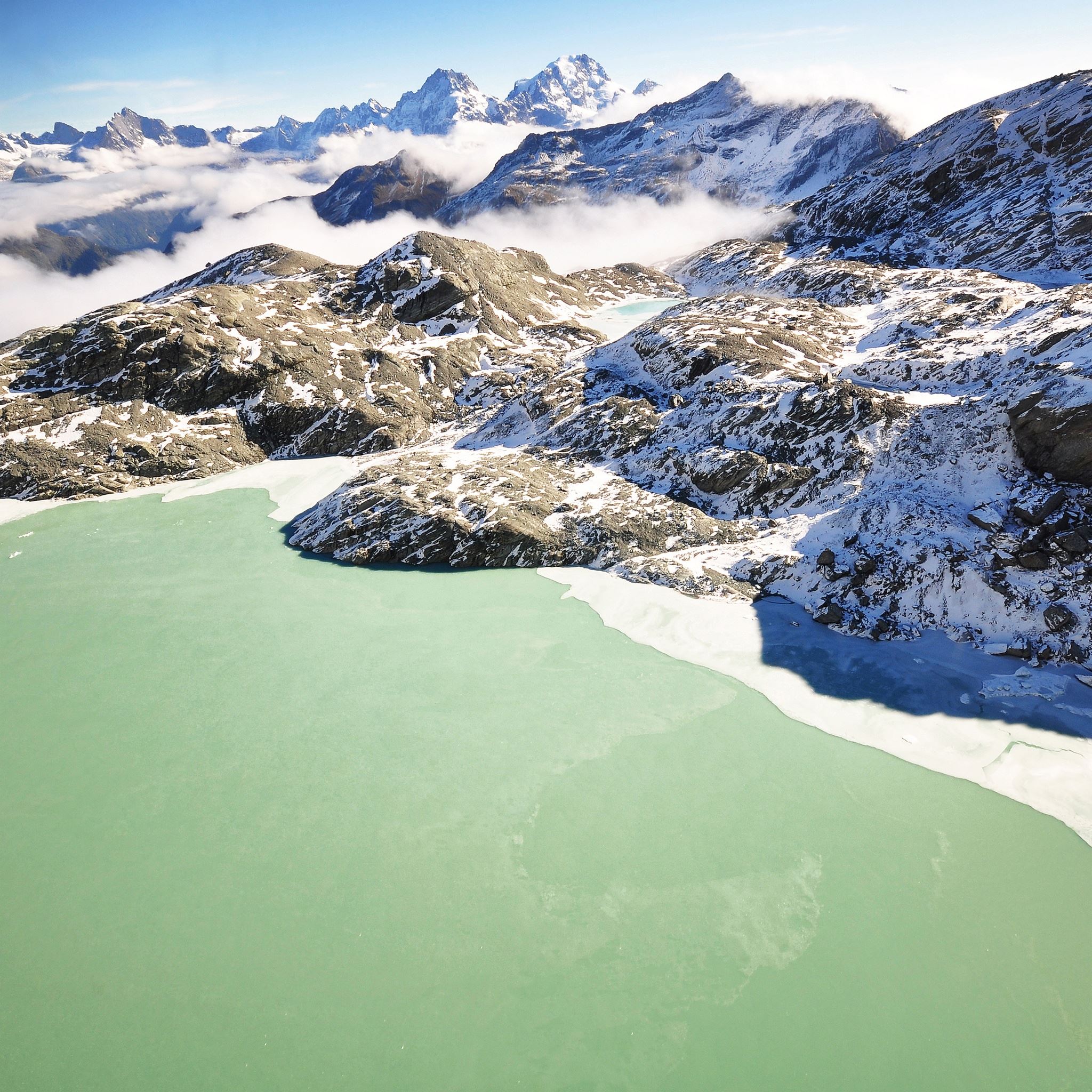 Snow Mountain Peaks And Lake iPad Air wallpaper 