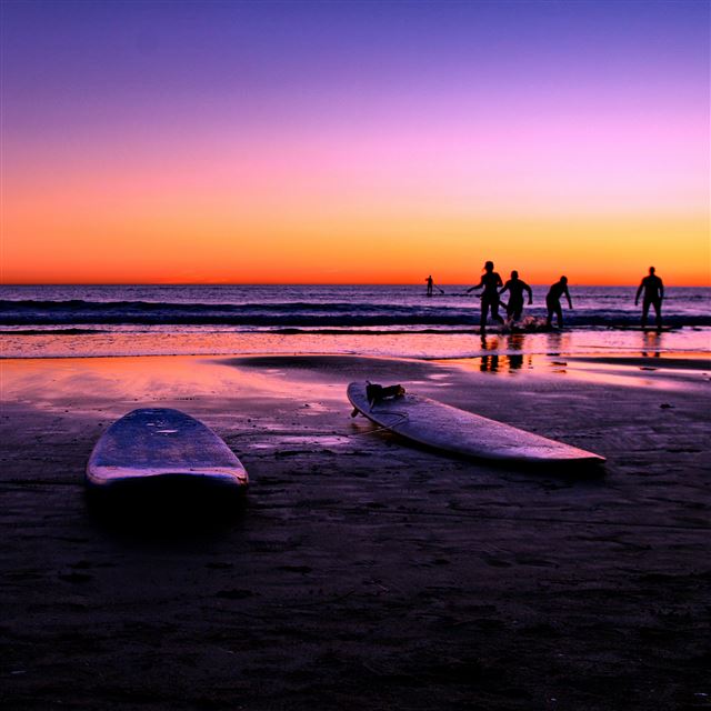 2048x2048 Seaside Surfers Beach Sunset - landscape iPad Air Wallpaper