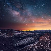 Shiny Sky View Over Snowy Mountains wallpaper