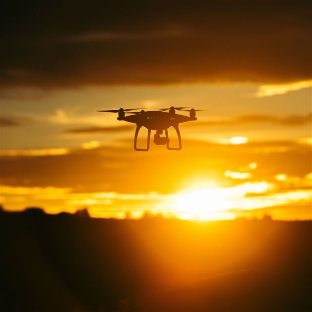 2048x2048 Quadrocopter Sunset Sky Flight Drone - sunshine iPad Air Wallpaper
