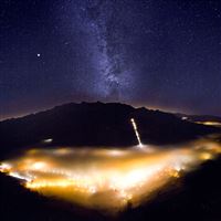 Foggy Valley with Milky Way wallpaper