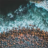 rocks sea coast 4k wallpaper