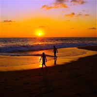 Sea sunset couple walk sand iPad Pro wallpaper