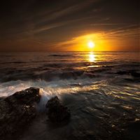 Sun decline evening stones waves orange landscape wallpaper