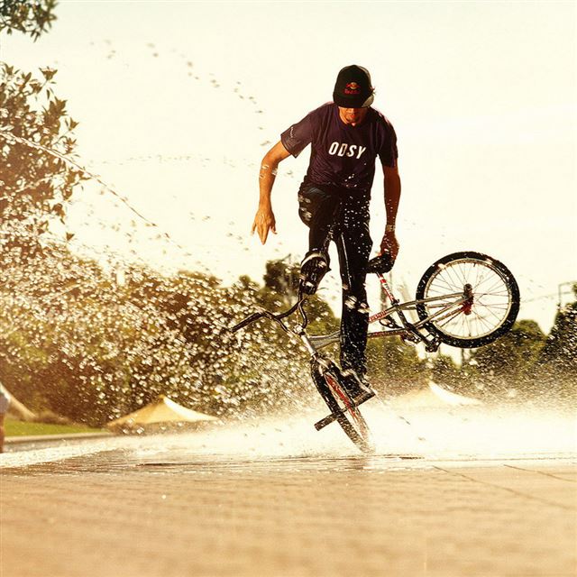 1024x1024 BMX Stunts - yellow iPad Wallpaper