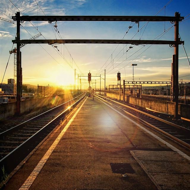 1024x1024 Sunset Light Over Railroad Tracks - orange iPad Wallpaper