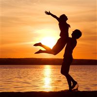 Lovers Flying Hug Under Sunset wallpaper