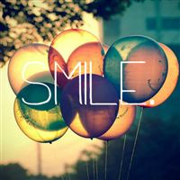 Smile Text Written On Retro Colored Ballons wallpaper
