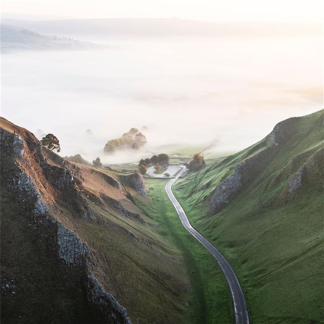 1024x1024 road betweeb grassy mountains - mountains iPad Wallpaper